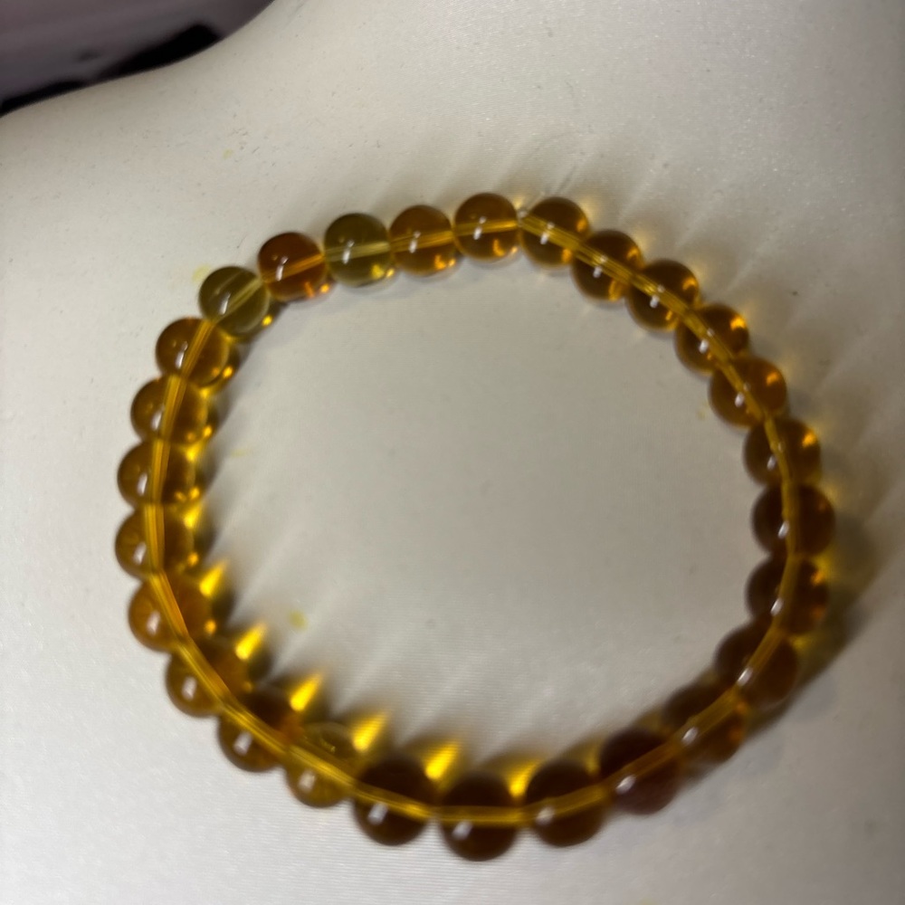 Amber color unknown glass Beaded Bracelet